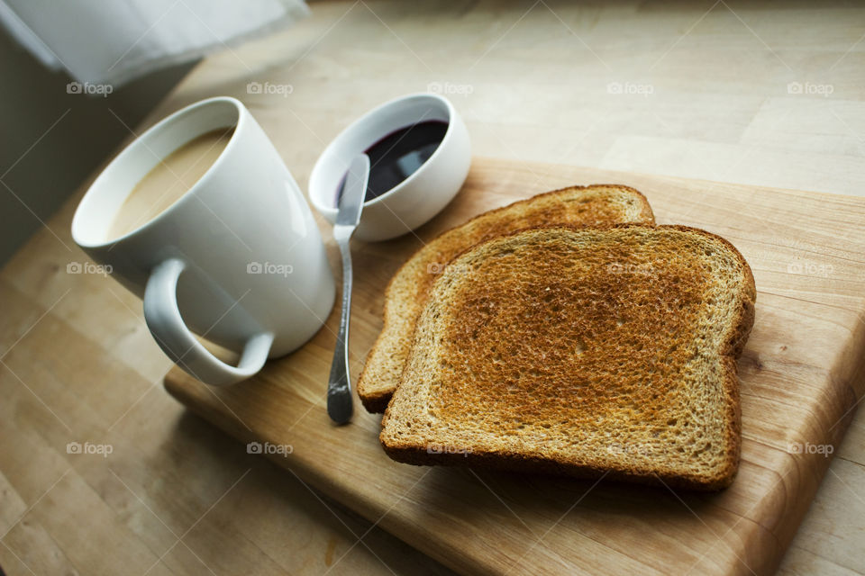 Toasted bread with coffee cup