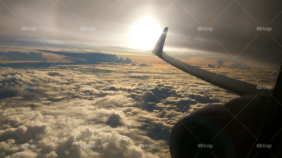 Sunrise Above The Clouds