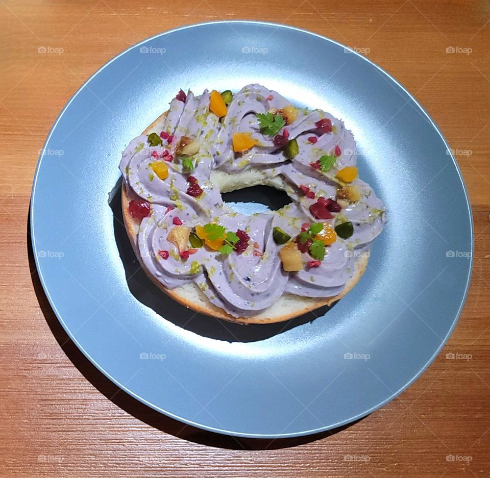 Bagels with blueberry cream and fruit