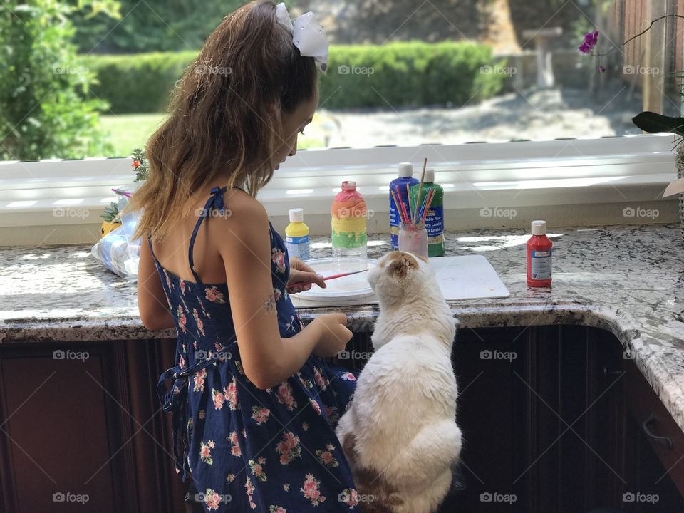 My, then, 9 year old daughter, Ashley. And our pet, Princess Peach. 