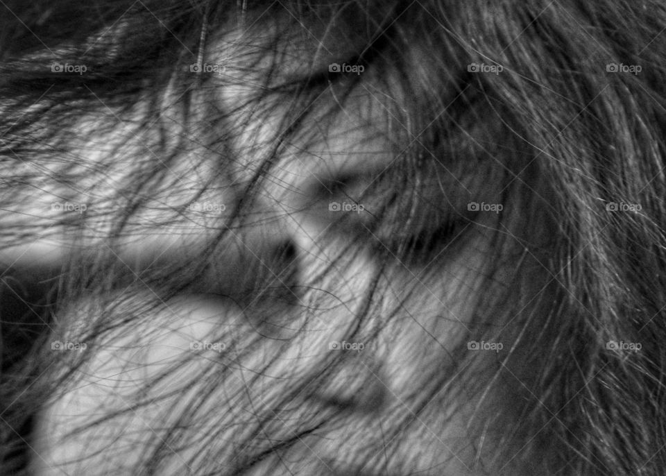 wind in hear of little girl