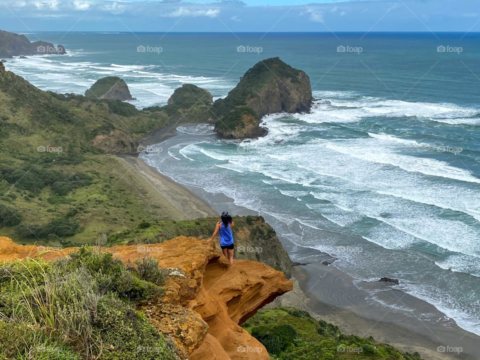 Don’t get too close to the edge! Looking down across the rugged west coast beaches of Auckland 