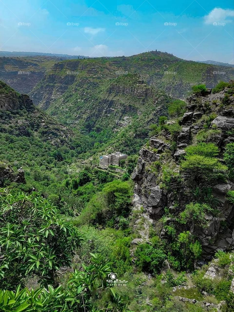 Glory be to God, the magnificent and picturesque view and the natural green trees are a view that is nothing more wonderful than it