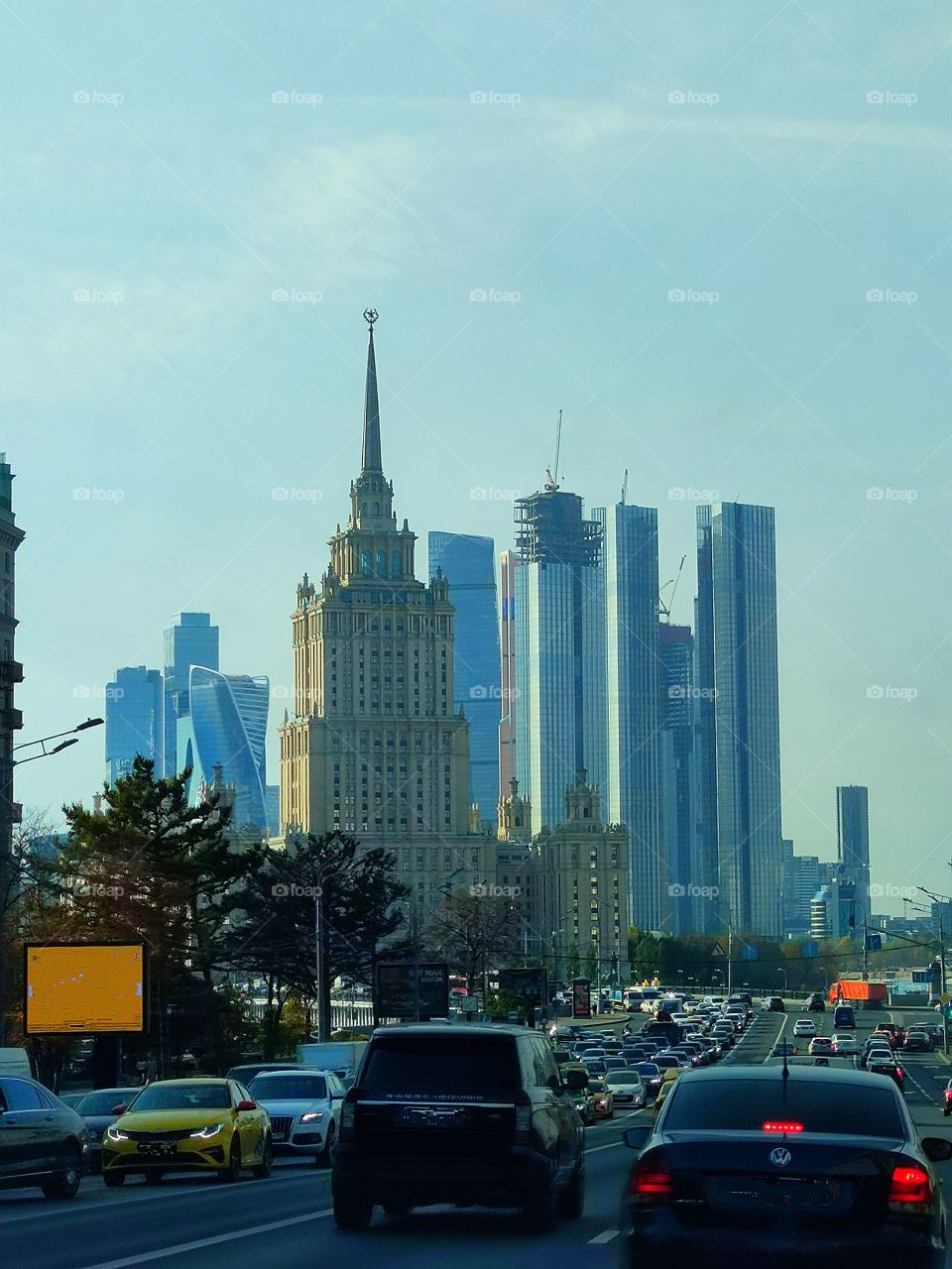 Megapolis.  Moscow.  View of the Radisson Hotel and the Moscow City business center from Kutuzovsky Prospekt.  Heavy traffic