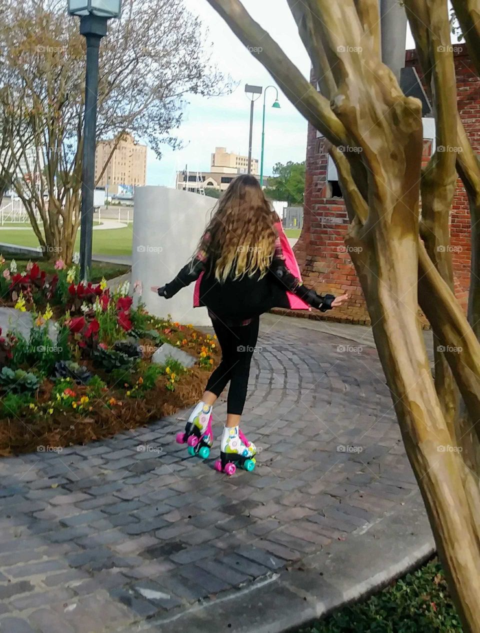 roller skating little girl