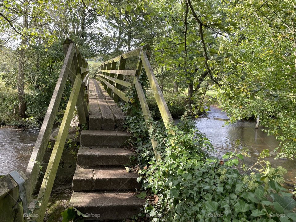 Wooden bridge over the river 