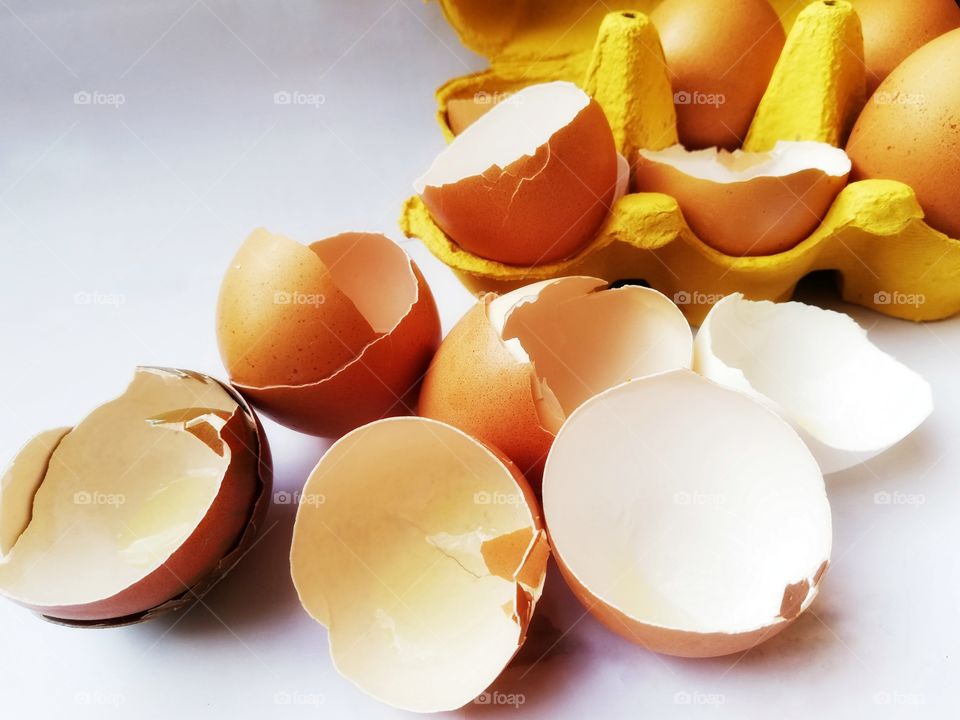 Egg shells on the table after cooking and making cakes