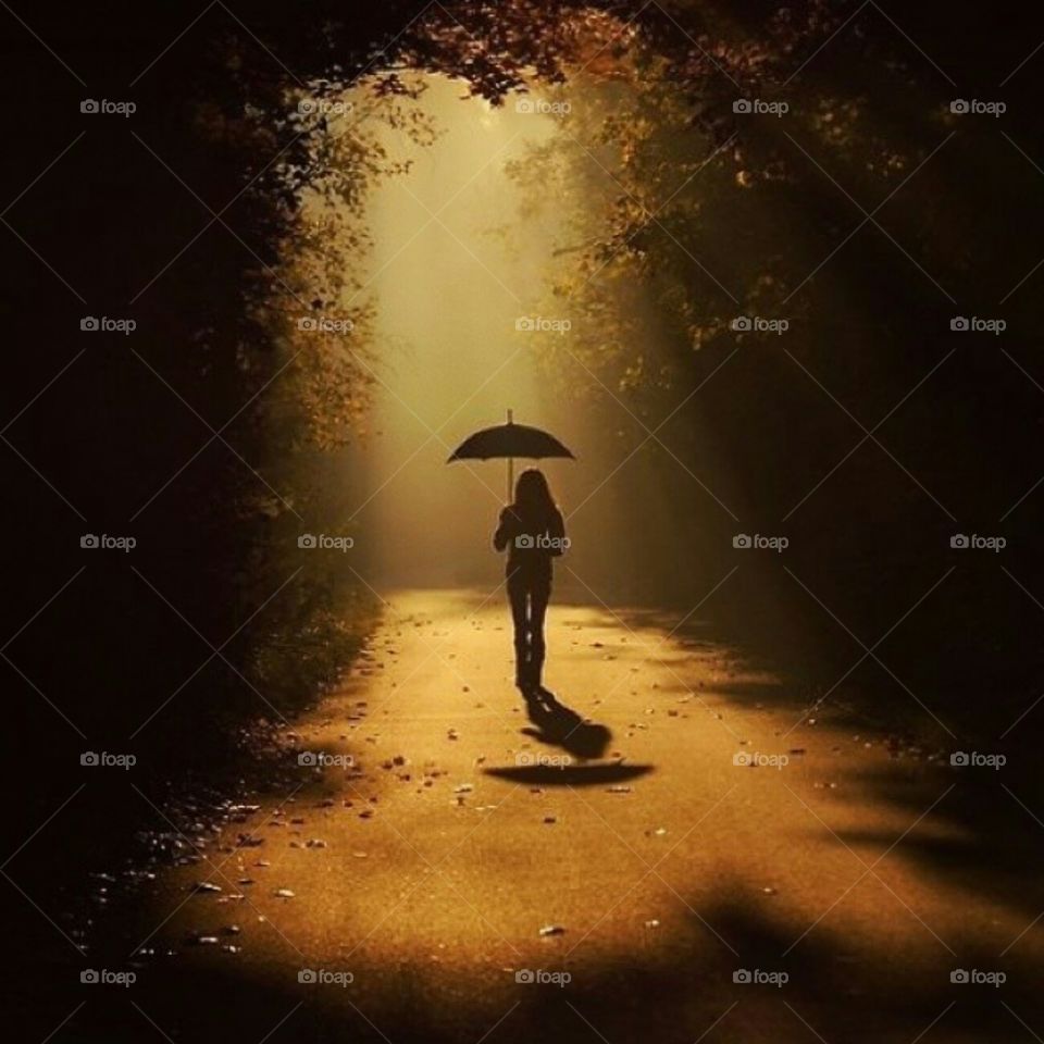 walking alon in the dark to reach the light.