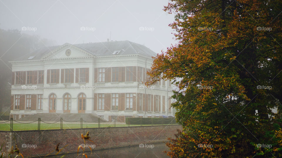 Architecture in the foggy morning