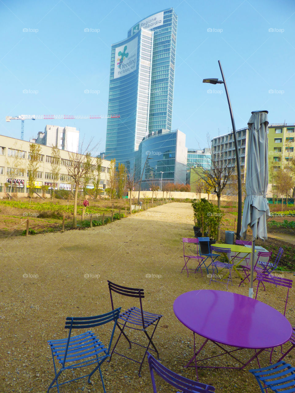 Tables and chairs in the park beside the downtown