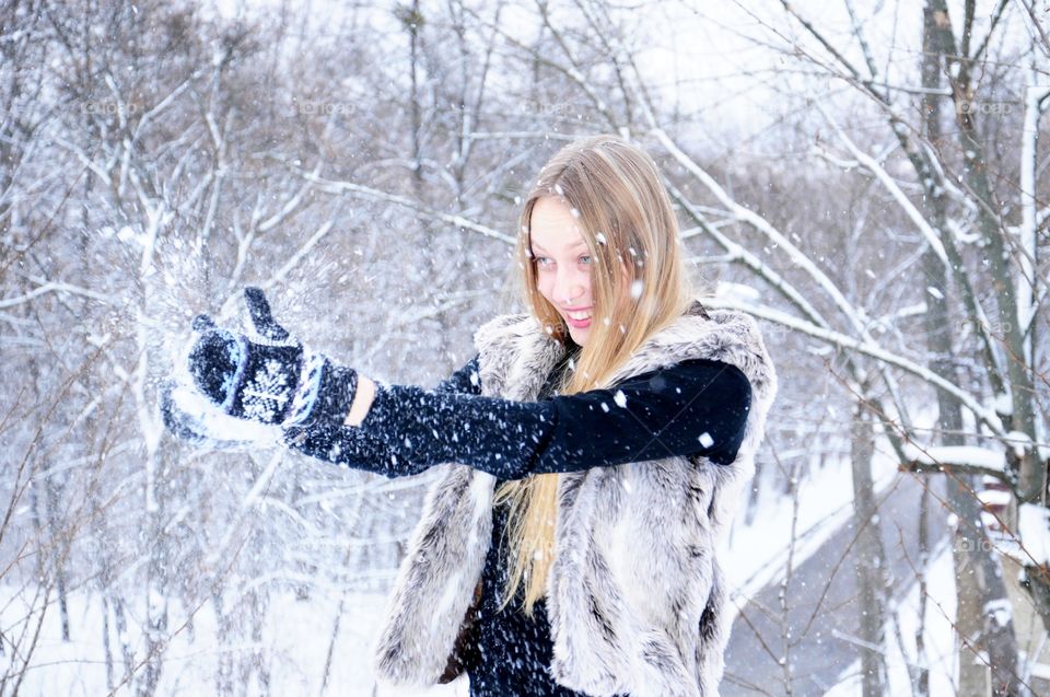 Woman holding snow ball