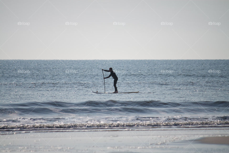 Paddle board on the water