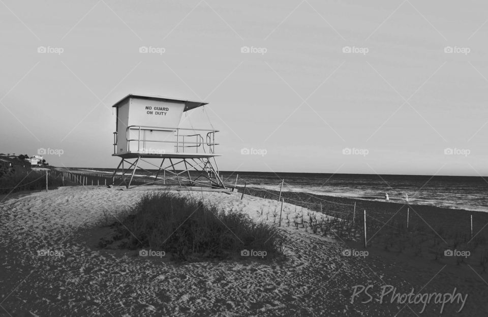 black and white lifeguard stand