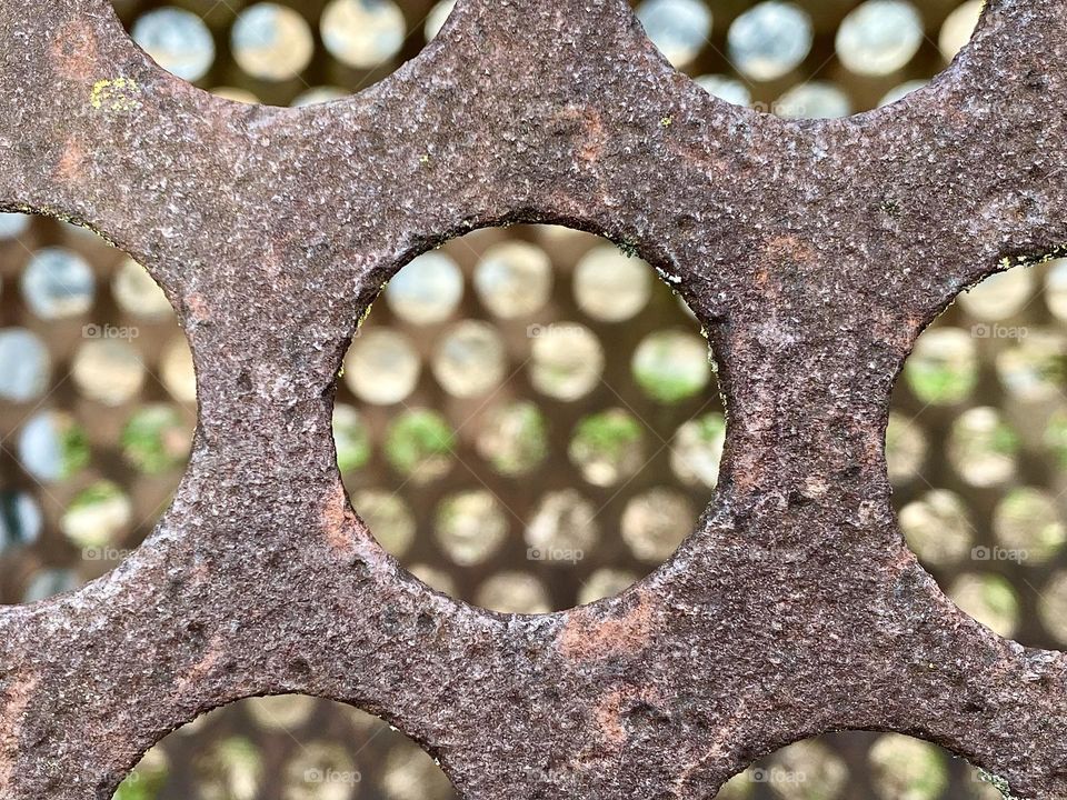 Rust on a metal sieve that sorted crushed rock at a quarry
