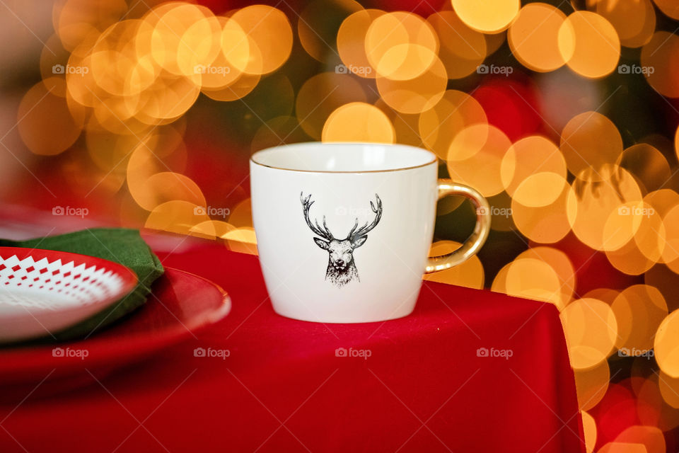 cup of coffee in a cozy festive Christmas atmosphere