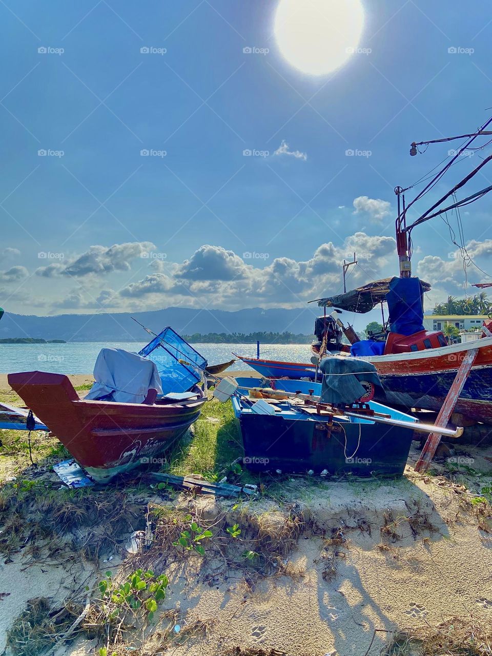 Beautiful abandoned boats on the sea shores of Thailand 