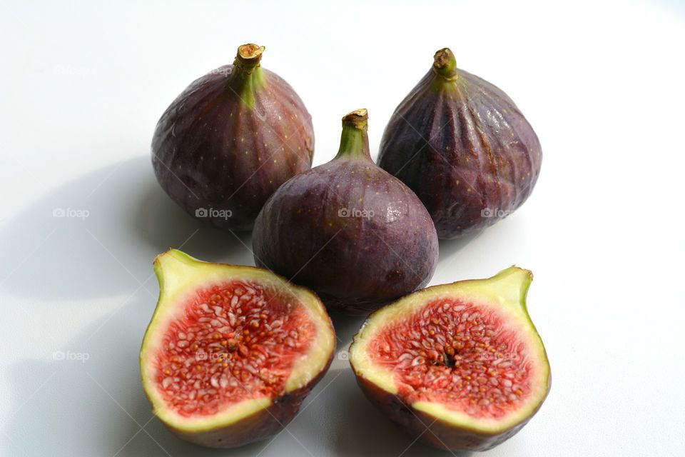 fresh figs on a white background top view healthy summer food