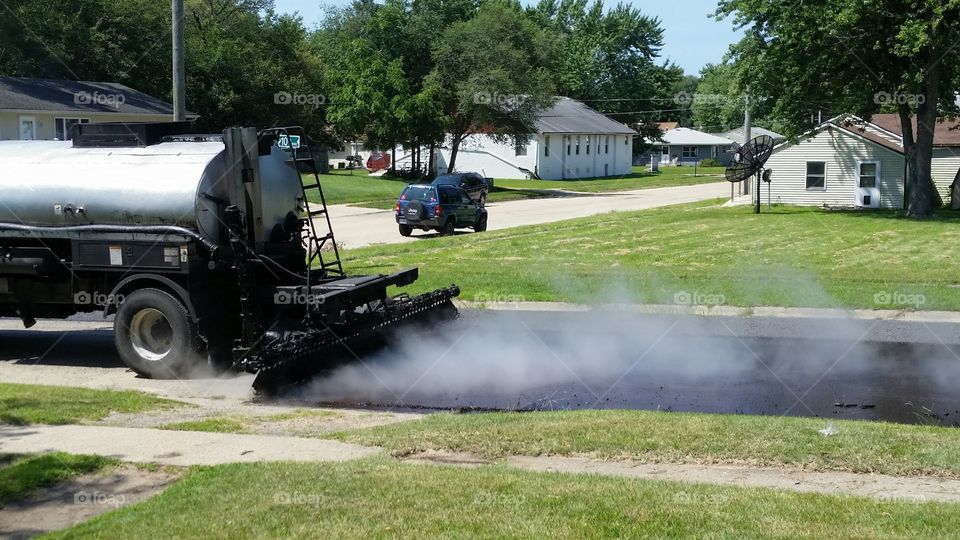 new pavement with rising steam