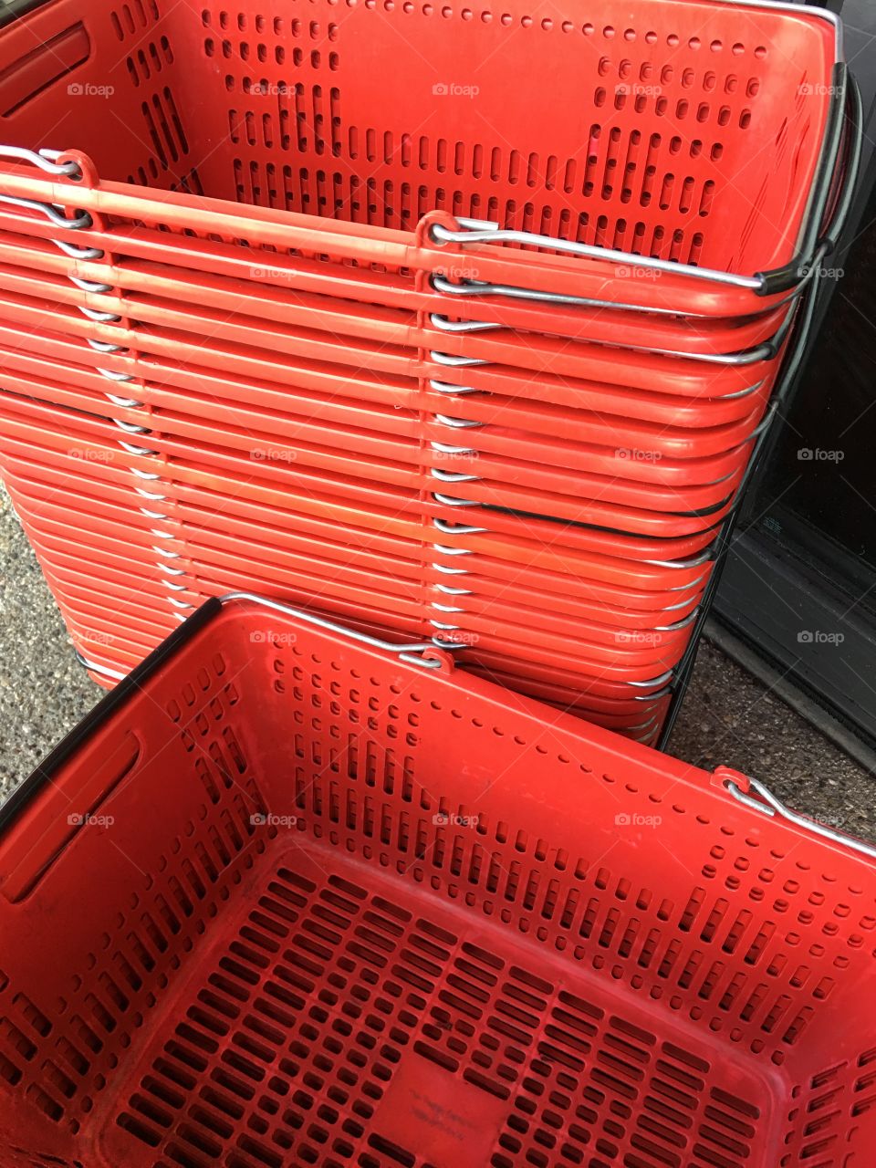 Red plastic shopping baskets 