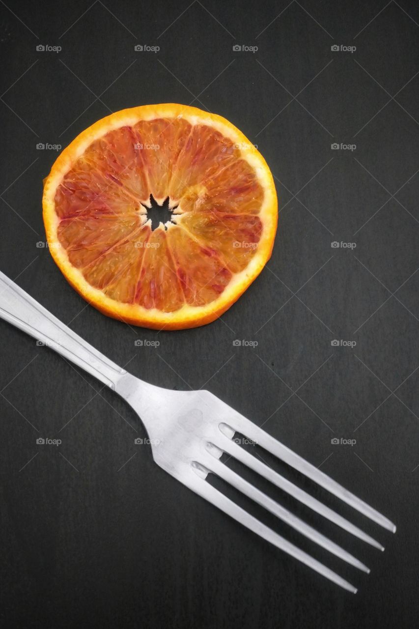 Fork & orange