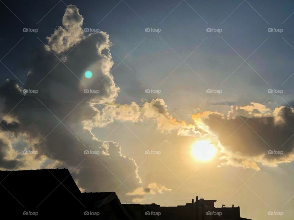 Almost sunset... looking at the sun and the sky in the street. A nostalgic feeling in a warm Autumn afternoon...