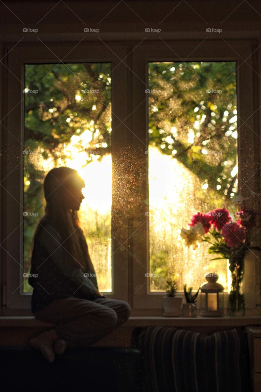 Girl near the window