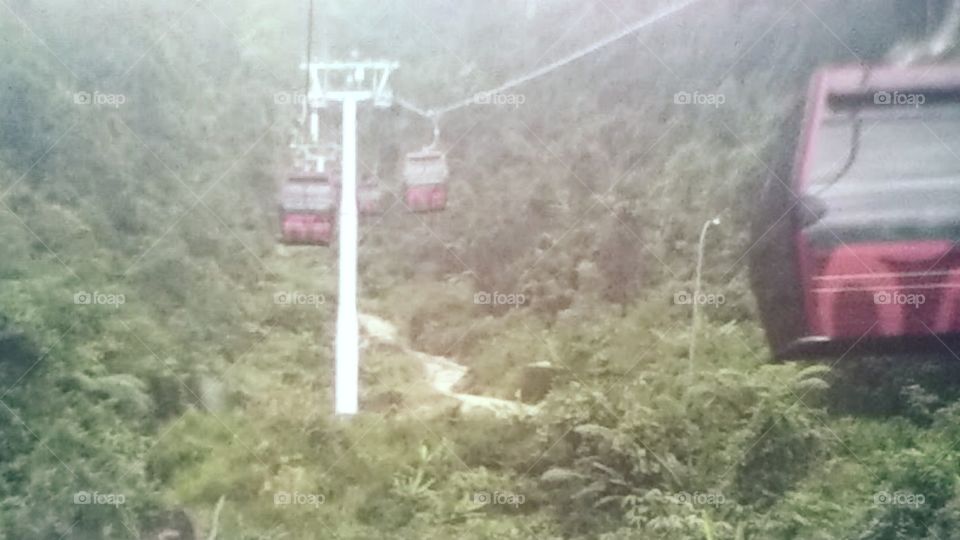 enjoying trip with great view from skyway cable car at Genting Highlands Malaysia..