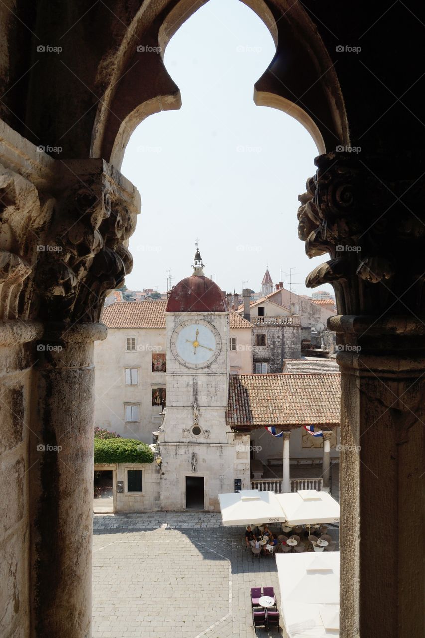 Clock tower through the window