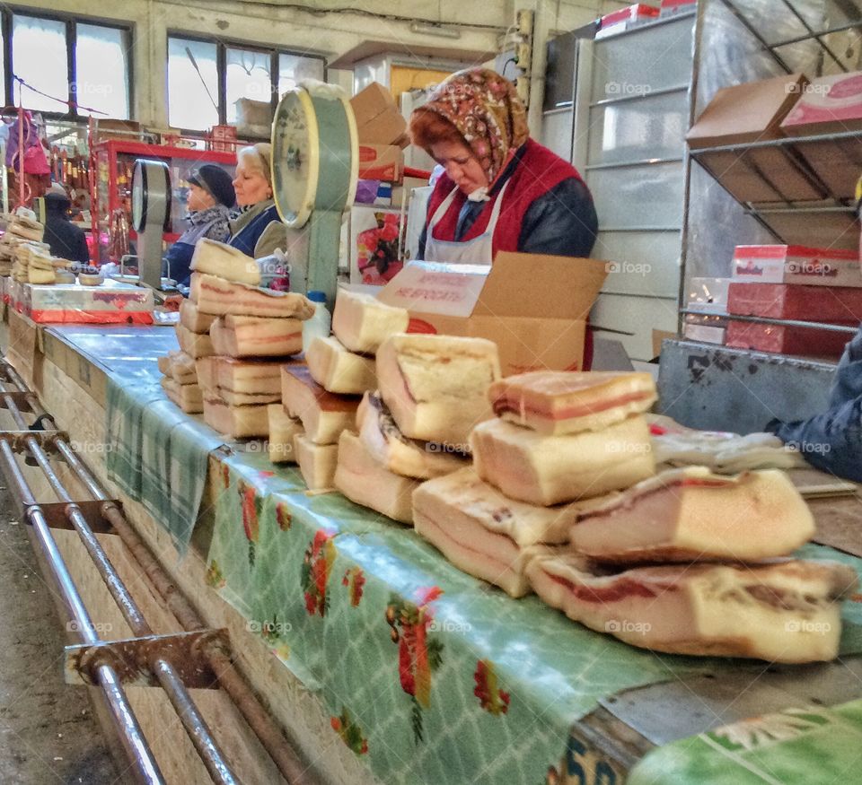 Bacon dealer. 

Picture taken at Taganrog (Russia) market. I used my phone for it. 