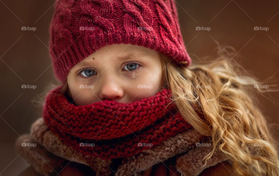Sad Little girl portrait with tear