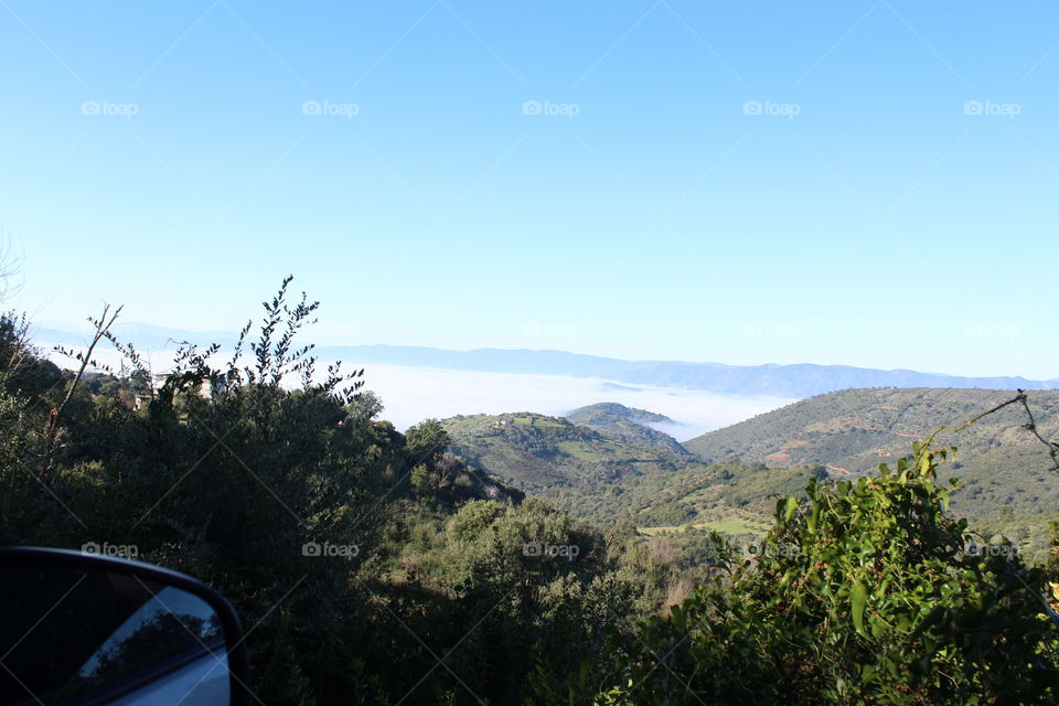 Fogg and sky over the village