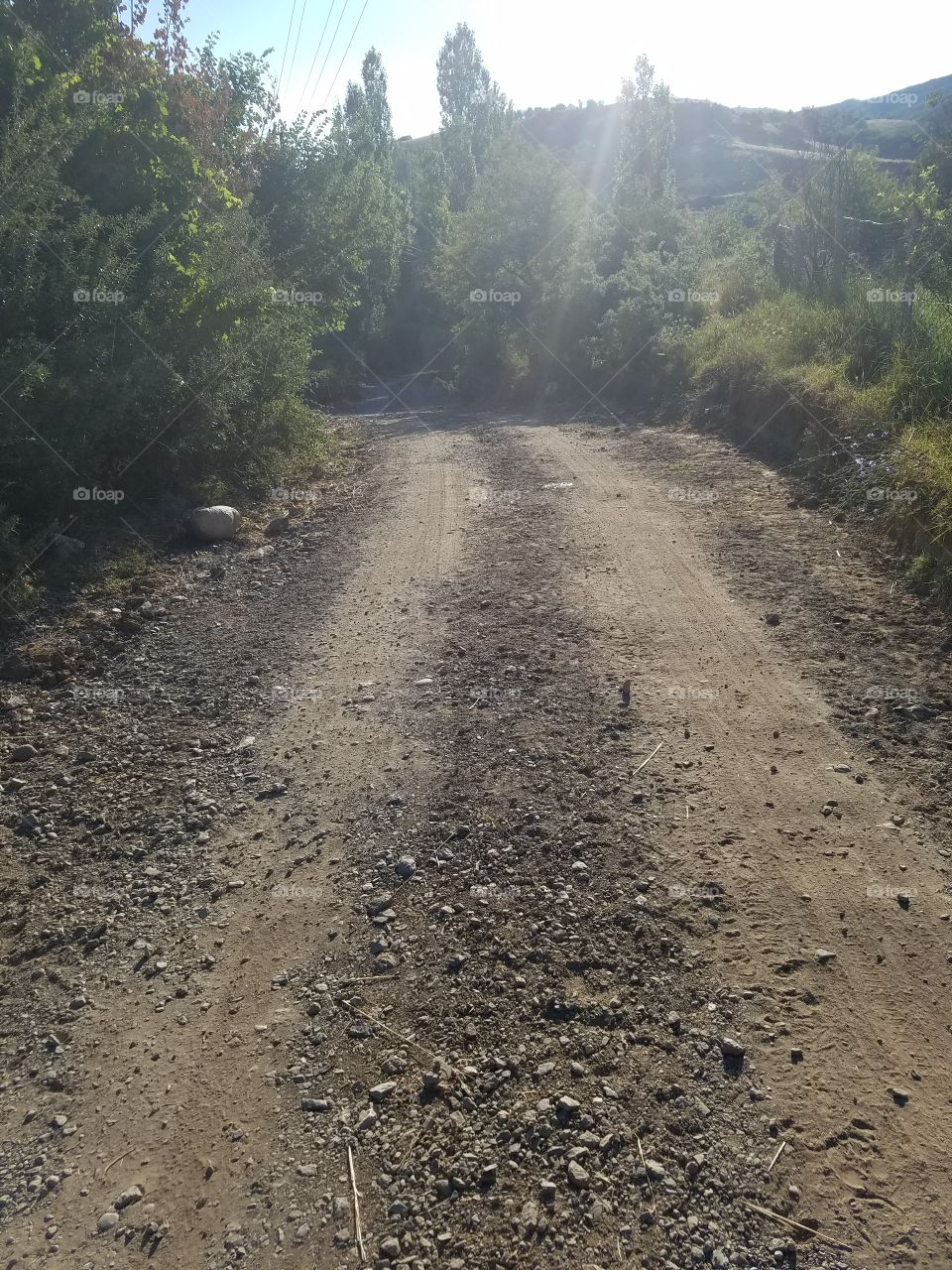 early morning hike down a dirt road in the mountains outside ankara turkey