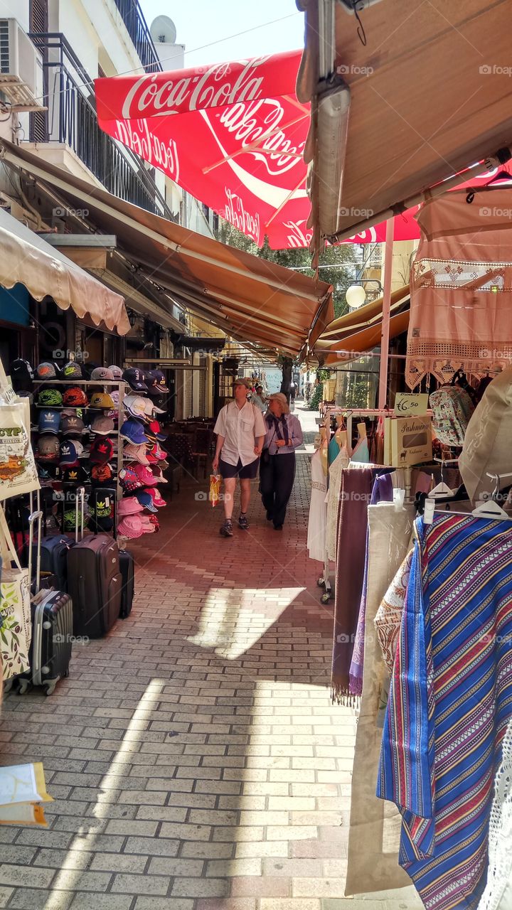 Tourists roam a paved alley in Nicosia,Cyprus