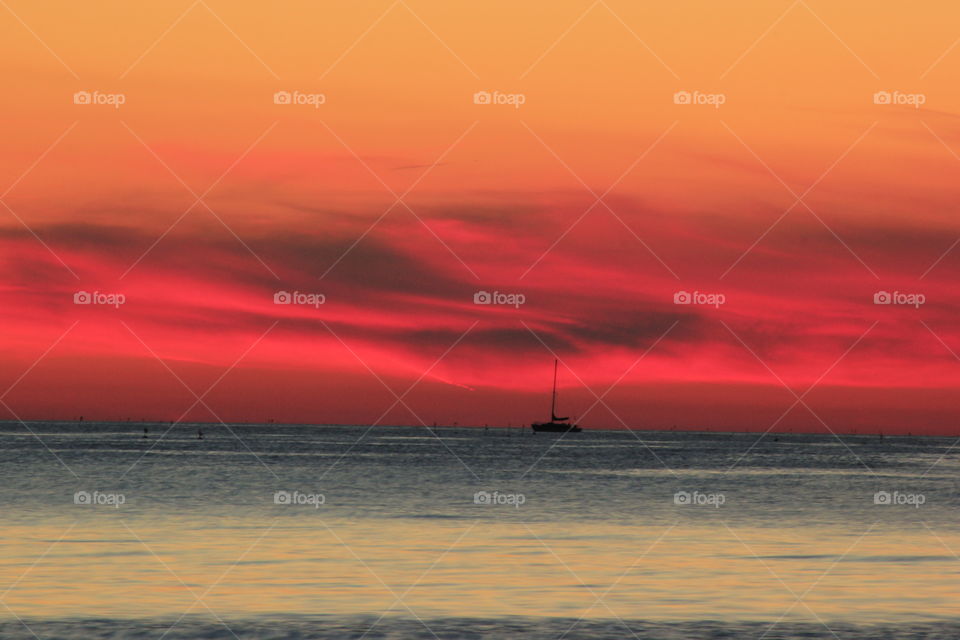 Scenic view of sea at sunrise