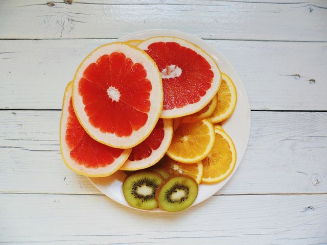 Citrus fruit slices on plate