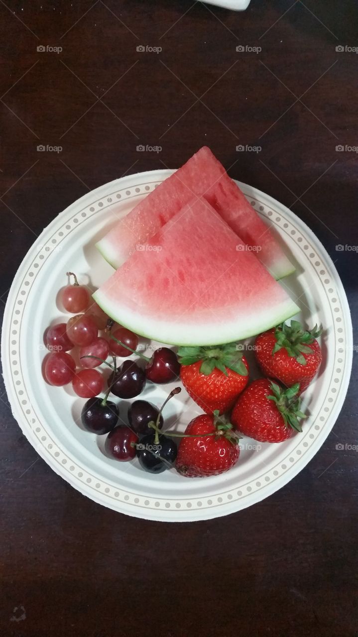 grapes,watermelon slices, cherries and strawberries
