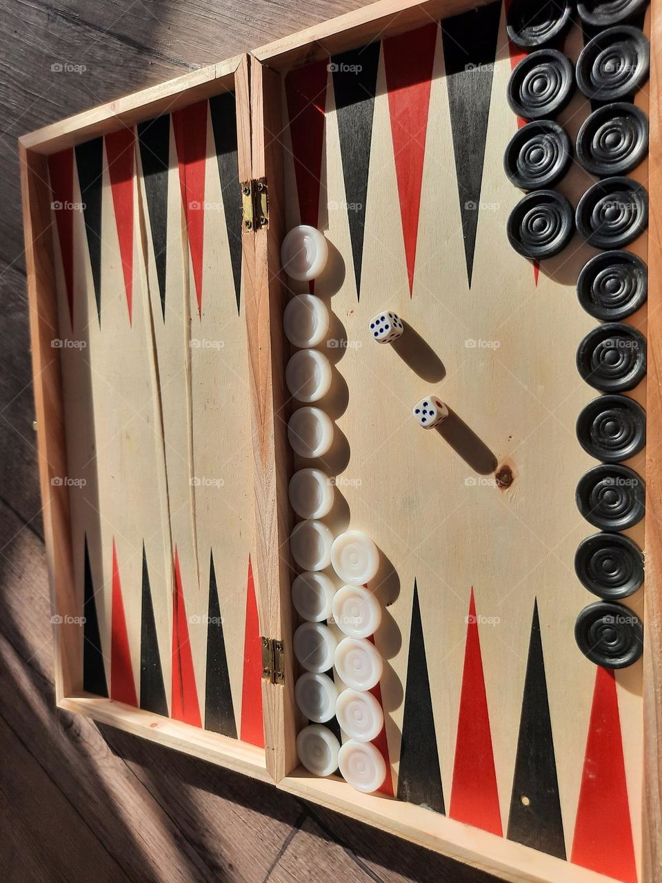 backgammon, an ancient game from the east, is based on thinking, strategy and luck.