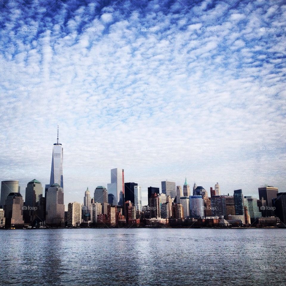 Feathered NYC clouds