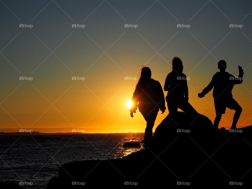 People, beach and sunset