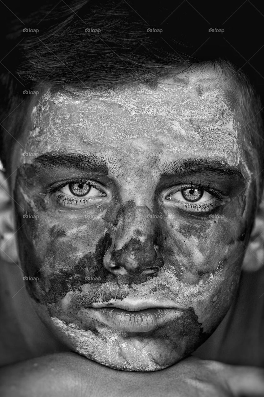 The Best Photo in Serbia.

They say eyes are the window to the soul. // Black and white portrait of boy with face painted .