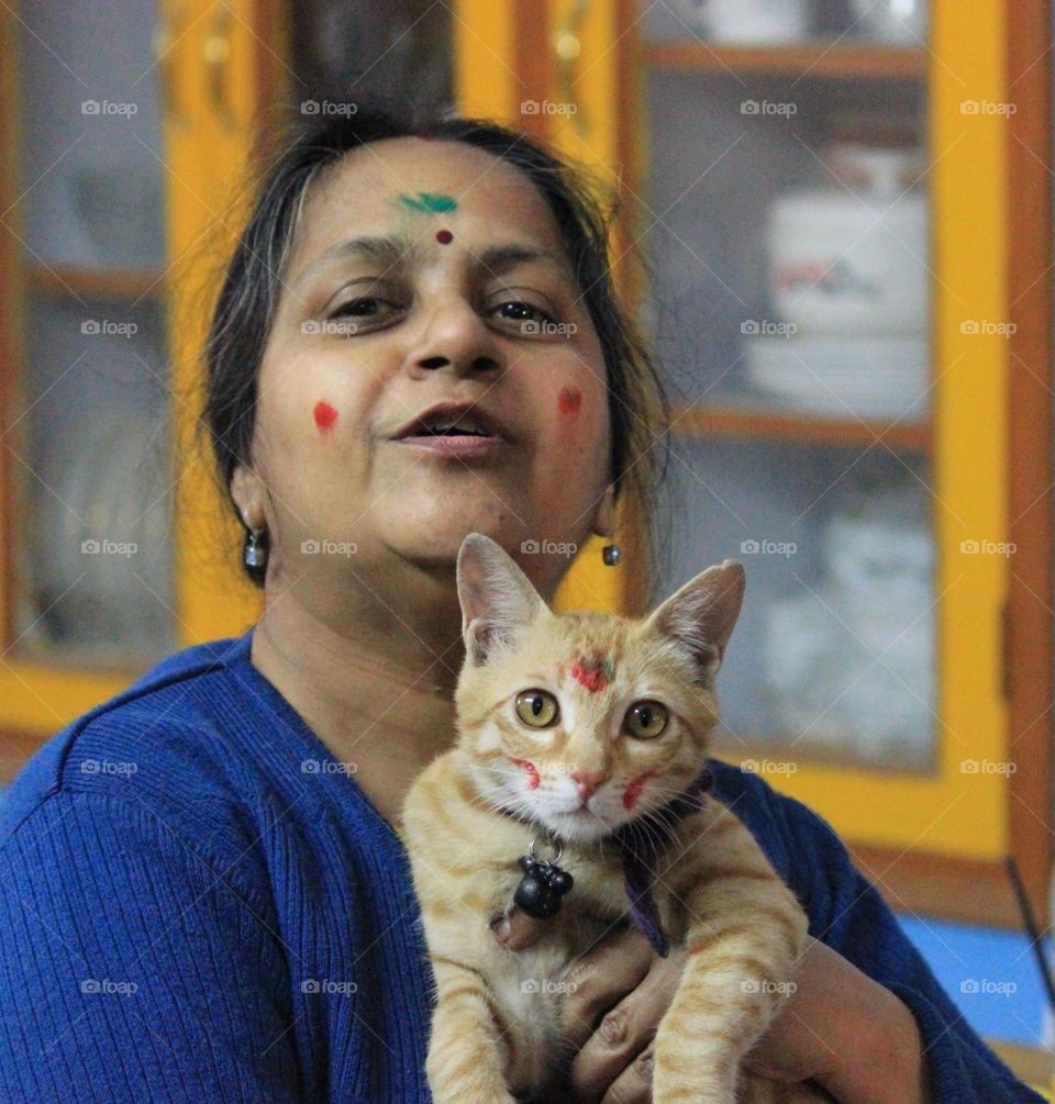 My Mother with my Kitten on his first Holi!