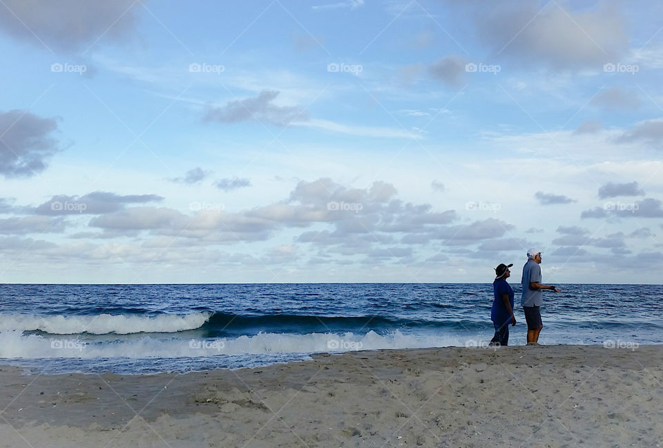 elderly couple at the beach