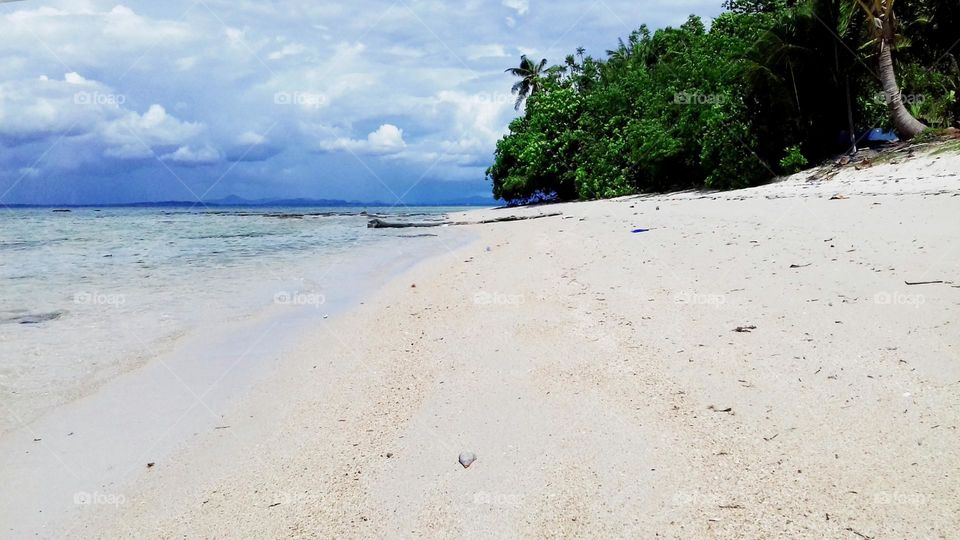 The beauty of white sand beach on Kalimambang Island, Belitung Islands, Indonesia.