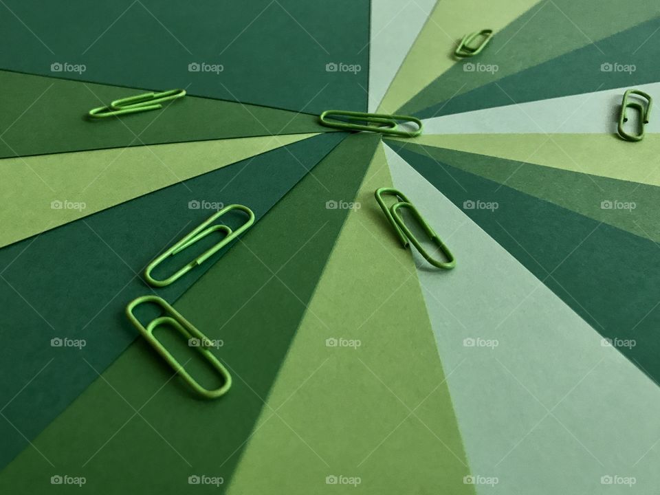 High angle view of green paper clip