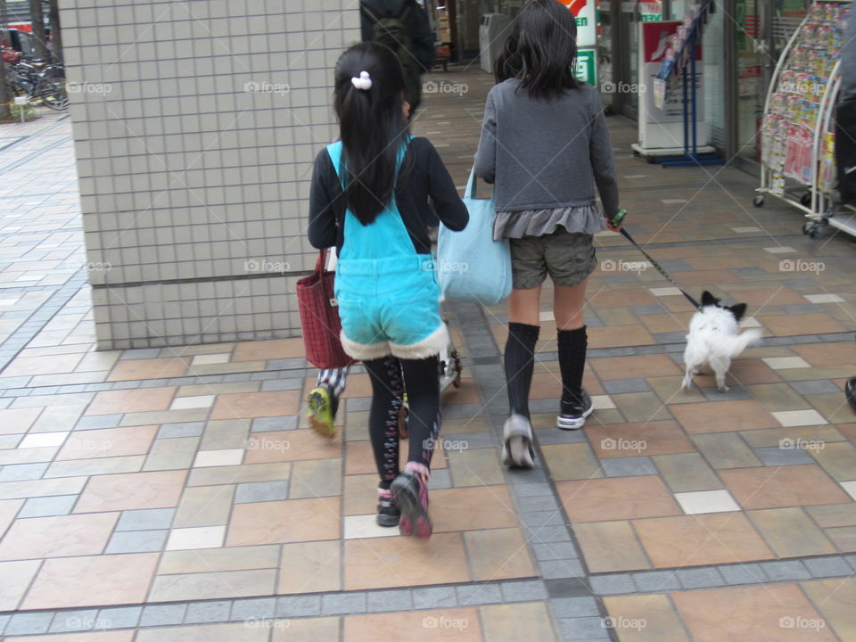 Two Little Girls Walking Their Dog in Nakameguro, Tokyo, Japan.  Cute.