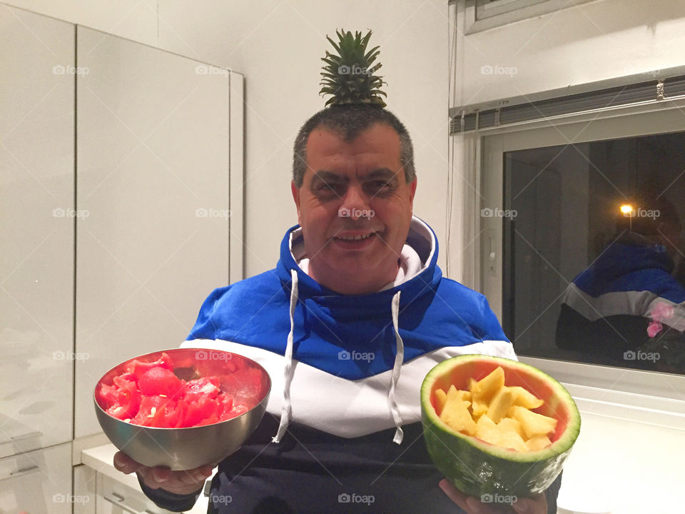 Man holding fruits