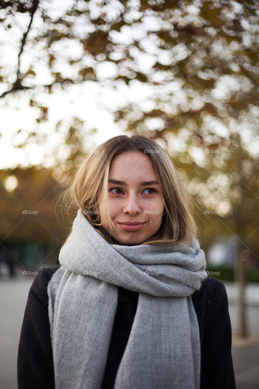 portrait photo of a young woman in nature