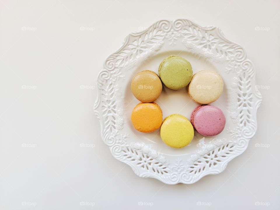 Delicious, tasty and a rainbow of French macarons made of apricot, coconut, fig, lemon, pistachio and salted caramel.