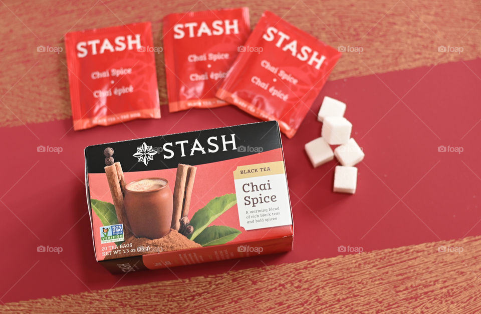 Stash tea, chai spice red background