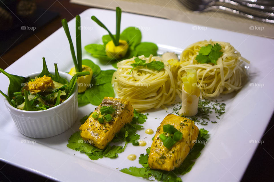 THE DINNER OF PASTA AND GRILLED SALMON